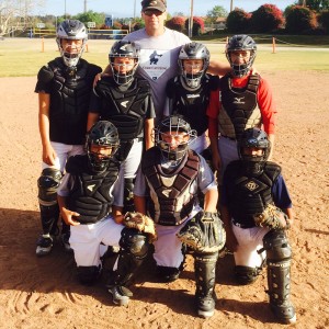 Group Photo of Coach Bennett and Catchers